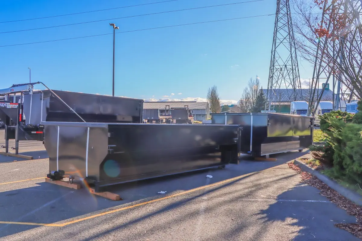 Roll-off dumpster ready for waste disposal at job site for 2 Yard Dumpster Rental in Oakland